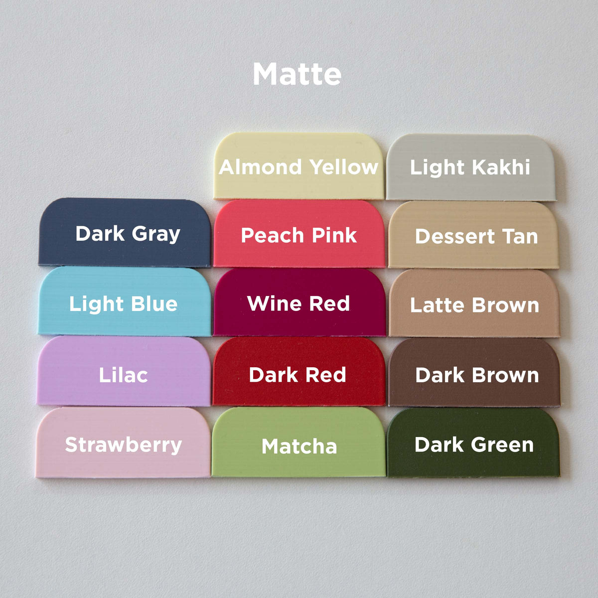 A collection of twelve different colored plastic dividers or markers, each labeled with a different color.