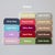 A collection of twelve different colored plastic dividers or markers, each labeled with a different color.